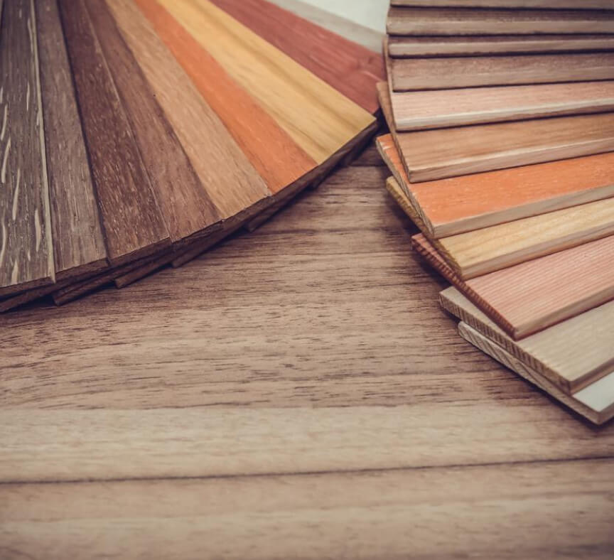 A Pallette of wooden tiles stacked together in different hues